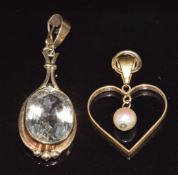 A 9ct gold pendant set with quartz (8.3g 3.8cm) and a yellow metal heart shaped pendant set with a
