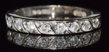 An 18ct white gold half eternity ring set with diamonds, 2.7g, size H/I