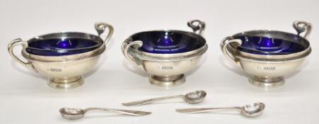 Set of three Edward VII Art Nouveau hallmarked silver salts with blue glass liners, London 1904,