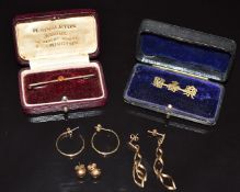 Three pairs of 9ct gold earrings, 9ct gold brooch (6g) and a Chinese brooch, in two vintage boxes