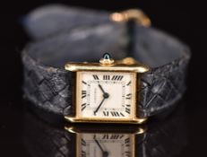 Cartier Tank 18ct gold ladies wristwatch with blued hands, black Roman numerals, silver dial,