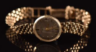 Rotary 9ct gold ladies wristwatch with gold hands and hour markers, silver dial and 21 jewel