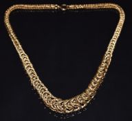 A 9ct gold cage link necklace made up of circular twisted links, 44.3g, 41cm long