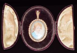 Georgian pendant set with an ivory portrait miniature depicting a young boy, signed, within a border