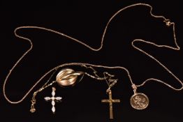 A 9ct gold bi-coloured pendant, 9ct gold St Christopher, two 9ct gold cross pendants, and two 9ct