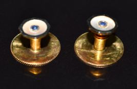 A pair of 18ct gold and 9ct gold Art Deco studs set with mother of pearl and a sapphire, in original