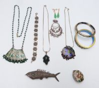 A large silver filigree fish, two cloisonné bangles, two enamel pendants, Chinese earrings, silver