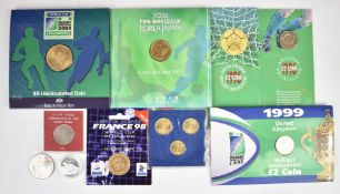 A collection of Royal Mint and other coin souvenir presentation packs, all sporting related