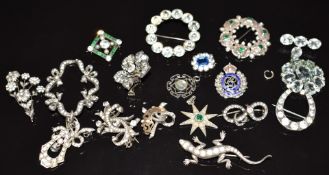 A collection of Victorian and early 20thC paste brooches including silver horseshoe, Birmingham