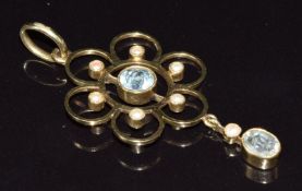 Edwardian 15ct gold pendant set with an aquamarine and seed pearls, 2.7g, 4cm