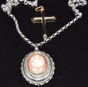 A 9ct gold cross (1.1g) and silver locket and chain