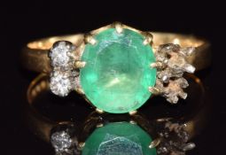 An 18ct gold ring set with an oval cut emerald of approximately 1.5ct, 3.4g, size P