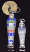 Two Egyptian silver propelling pencils in the form of mummies set with enamel