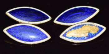 A pair of 18ct gold cufflinks set with enamel, 7.4g