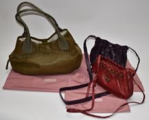 Three Radley ladies leather handbags, all with branded dust bags