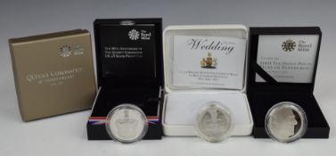 Three Royal Mint commemorative crowns comprising Prince William's Wedding, HRH Prince Philip and the