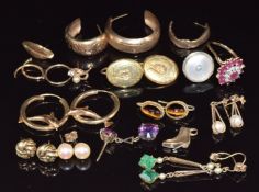 A pair of 9ct gold earrings set with a pearl to each, 9ct gold dolphin earrings, 9ct gold earrings