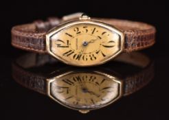 Cartier Art Deco tonneau 14ct gold wristwatch with black Arabic numerals, blued skeleton hands, gold