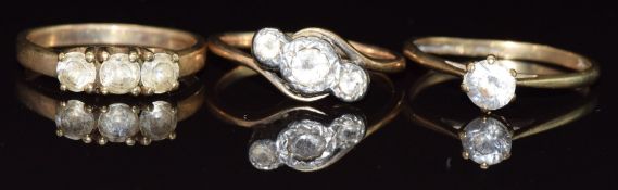 Three 9ct gold rings set with paste, 6.1g, size N/O
