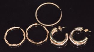Two pairs of 9ct gold earrings and a single 9ct gold earring, 5g