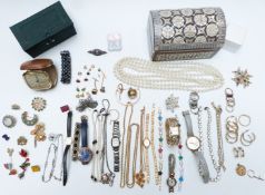 A collection of jewellery including Arts & Crafts silver brooch set with an amethyst, lucite brooch,