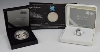 Royal Mint The Royal Birth 2013 commemorative silver proof crown, together with a brilliant