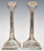 Pair of Elizabeth II hallmarked silver Corinthian column candlesticks, Birmingham 1970, maker L D