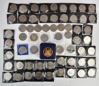 Over fifty modern commemorative crowns to include Churchill, Charles and Diana and £5 examples and a