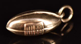 A 9ct gold rugby ball pendant/ charm, 2.8g