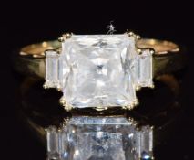 A 14ct gold ring set with cubic zirconia, 2.9g, size P