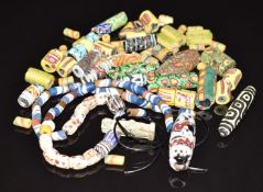 A collection of 19thC and earlier Venetian/ Egyptian glass beads including millefiori an Egyptian