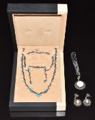 Two suites of silver jewellery, one set with mother of pearl and marcasite the other faux
