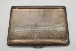 Art Deco style Elizabeth II hallmarked silver engine turned cigarette case with 9ct gold band