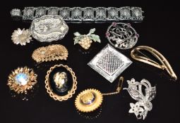 A collection of brooches including Sarah Coventry, Coro, Exquisite, Sandor Co, Sporrong & Co,