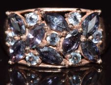 A 9ct rose gold ring set with marquise cut and round cut topaz, 4.1g, size U