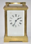 Brass cased carriage clock, the movement marked WJH, height including handle 15cm
