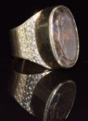 A 1970's 9ct gold ring set with smoky quartz, 9.2g, size R