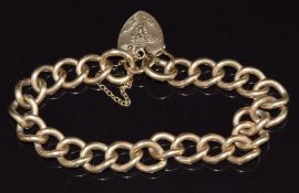 A 9ct gold curb link bracelet, 31.4g, 21cm long