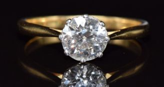 An 18ct gold ring set with a round cut diamond of approximately 1.35ct, 3.5g, size Q