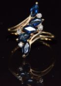 A 9ct gold ring set with sapphires and diamonds, 2.6g, size N