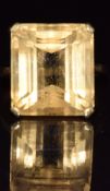 A yellow metal ring set with an emerald cut citrine, 5.9g, size J/ K