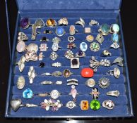 Sixty five silver rings including pearl, amethyst, labradorite, tigers eye, abalone, rose quartz,