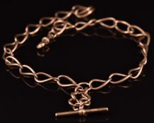 A c1900 9ct rose gold Albert/ fob chain made up of twisted oval links, 41.9g, 45cm long