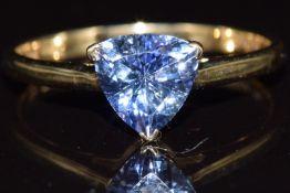 A 9ct gold ring set with a trillion cut tanzanite, 1.7g, size P