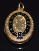 Victorian locket with chased decoration and enamel reading 'In Memory Of', 2.3 x 3cm