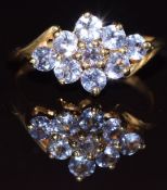 A 9ct gold ring set with tanzanites, 2.3g, size K/L
