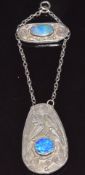 Arts & Crafts silver pendant set with black opals with a letter L embossed to the back
