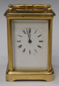 Brass cased carriage clock with two train movement striking on a bell, the movement marked JT,