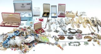 A collection of jewellery including a 9ct gold watch and strap (7.3g), silver fob chain made from