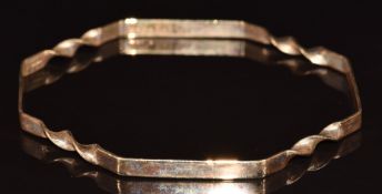 A 9ct gold octagonal bangle with rope twist decoration, 7.4g, diameter 7cm